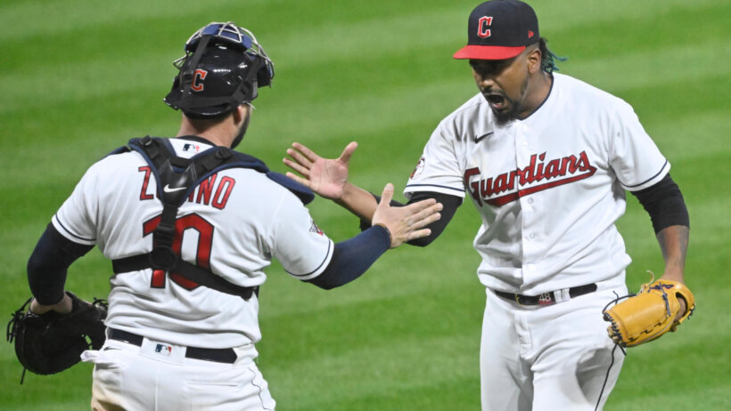 Cleveland Guardians players celebrating after a win.