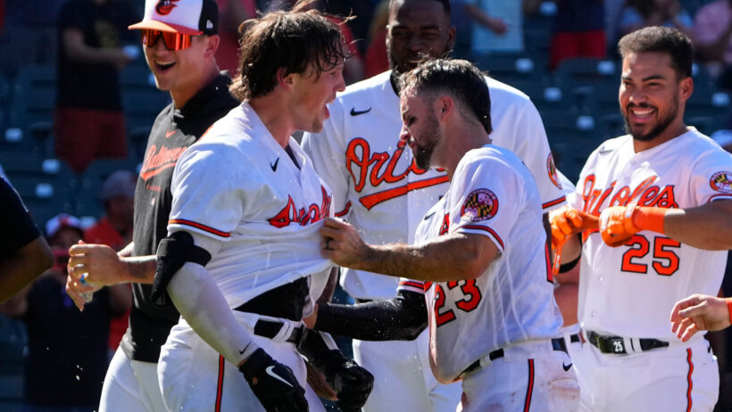 Baltimore Orioles players celebrating after hitting a game winning homerun.