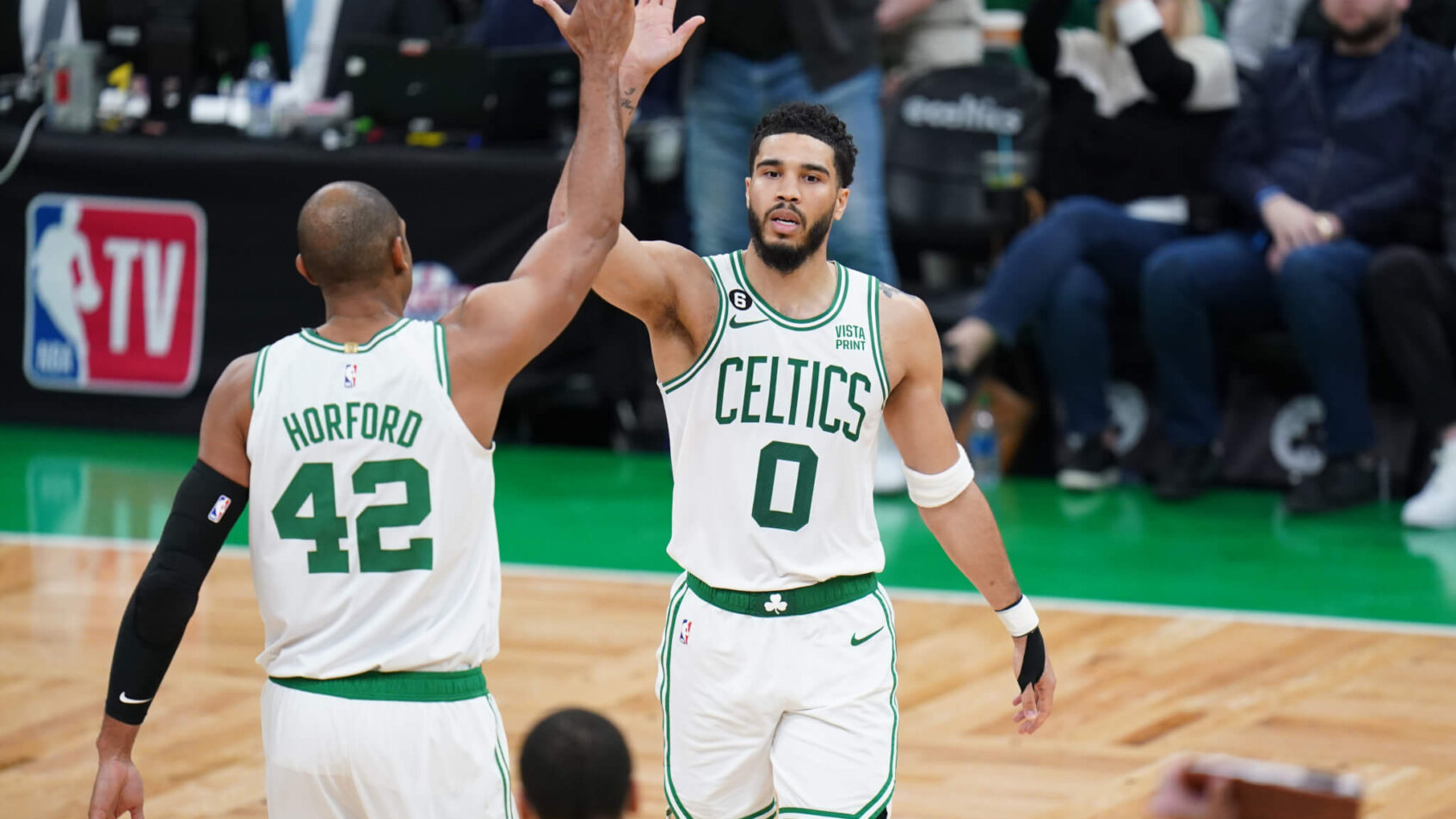 Boston Celtics players Jayson Tatum and Al Horford