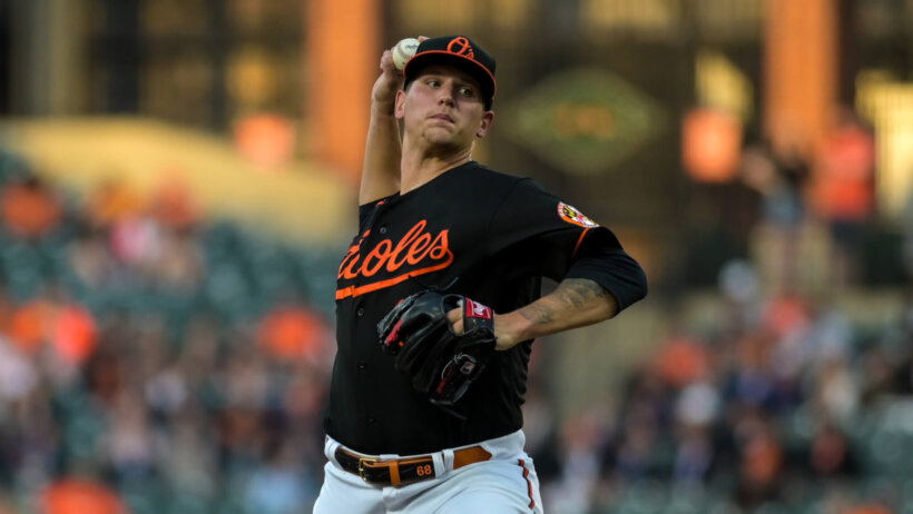 Baltimore Orioles starting pitcher Tyler Wells mid-pitch