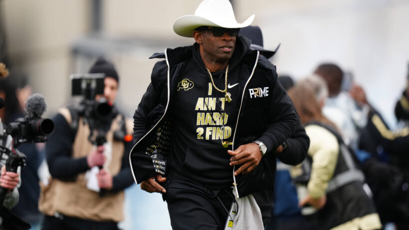 Colorado Buffaloes head coach Deion Sanders hits the field before the start of the spring game