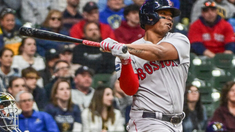 Boston Red Sox third baseman Rafael Devers hits a home run