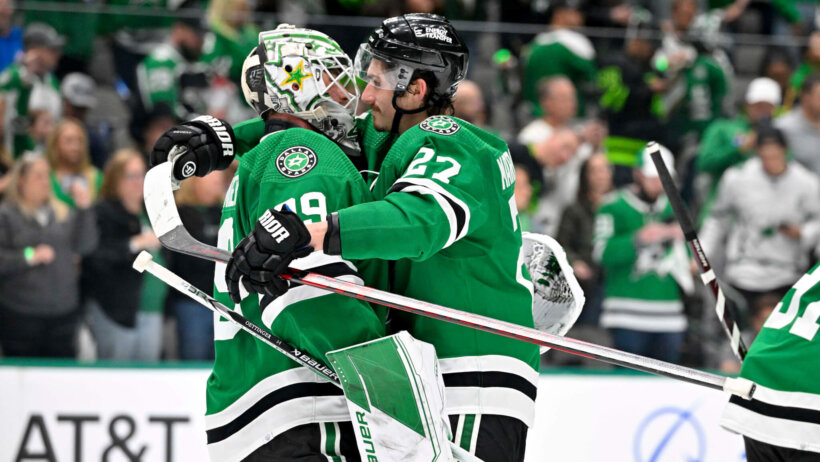 Dallas Stars goaltender Jake Oettinger and left wing Mason Marchment celebrate victory over the Minnesota Wild