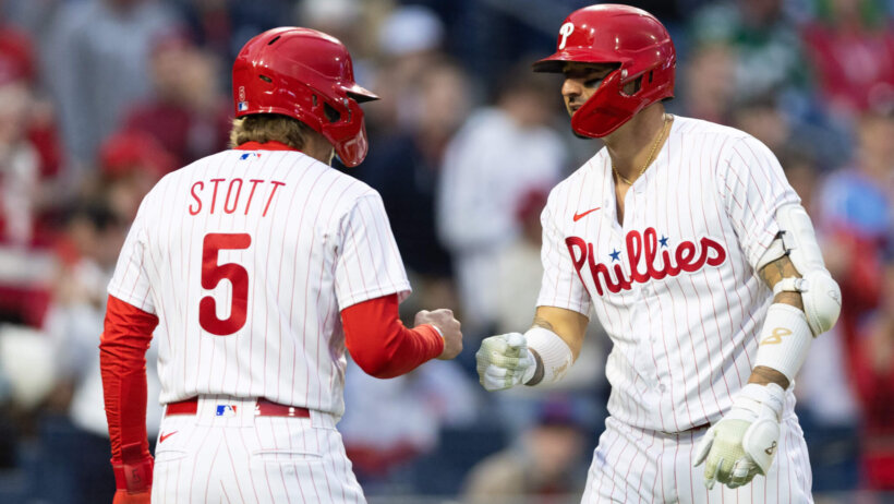 Phillies players celebrating a home run