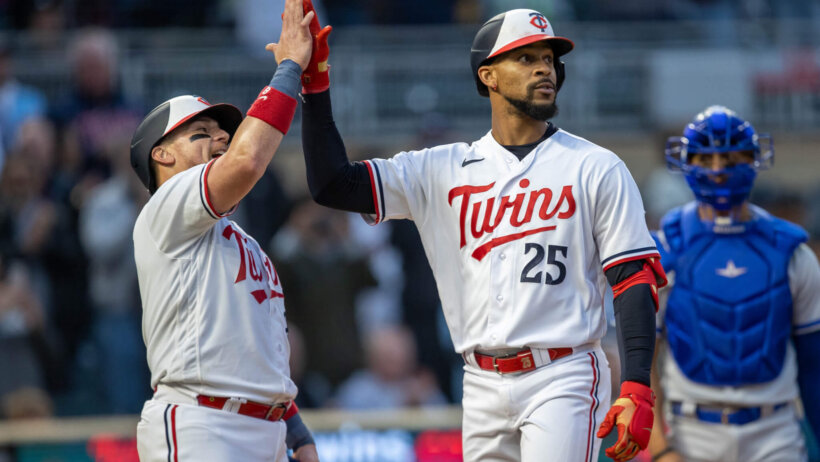 Minnesota Twins designated hitter Byron Buxton celebrates with catcher Christian Vazquez