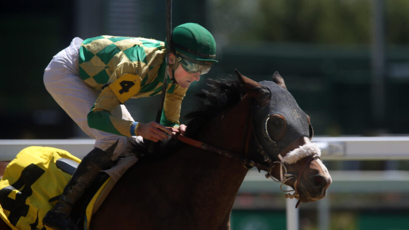 Jack Gilligan on Dogwoodsmilliejane won the first race called The Old Sears Building on Tuesday of Kentucky Derby week