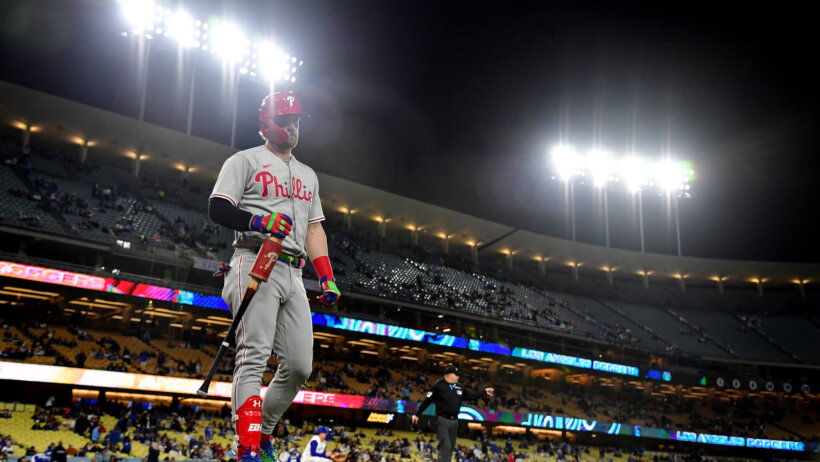 Philadelphia Phillies designated hitter Bryce Harper walks to the plate