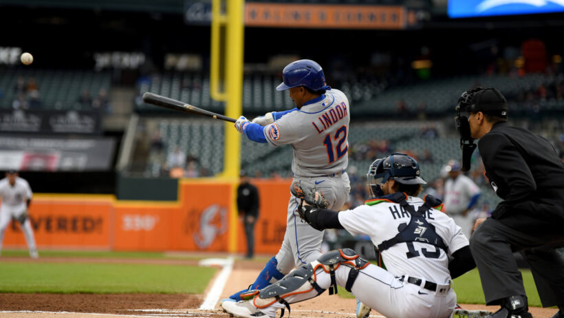 New York Mets shortstop Francisco Lindor hitting a single