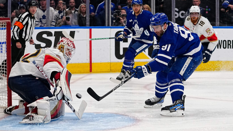 Florida Panthers goaltender Sergei Bobrovsky makes a save against Toronto Maple Leafs forward John Tavares