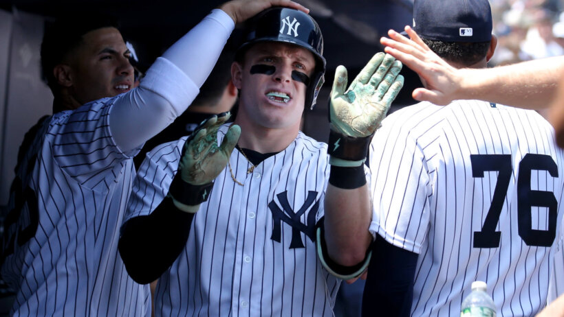 New York Yankees center fielder Harrison Bader celebrates in the dugout