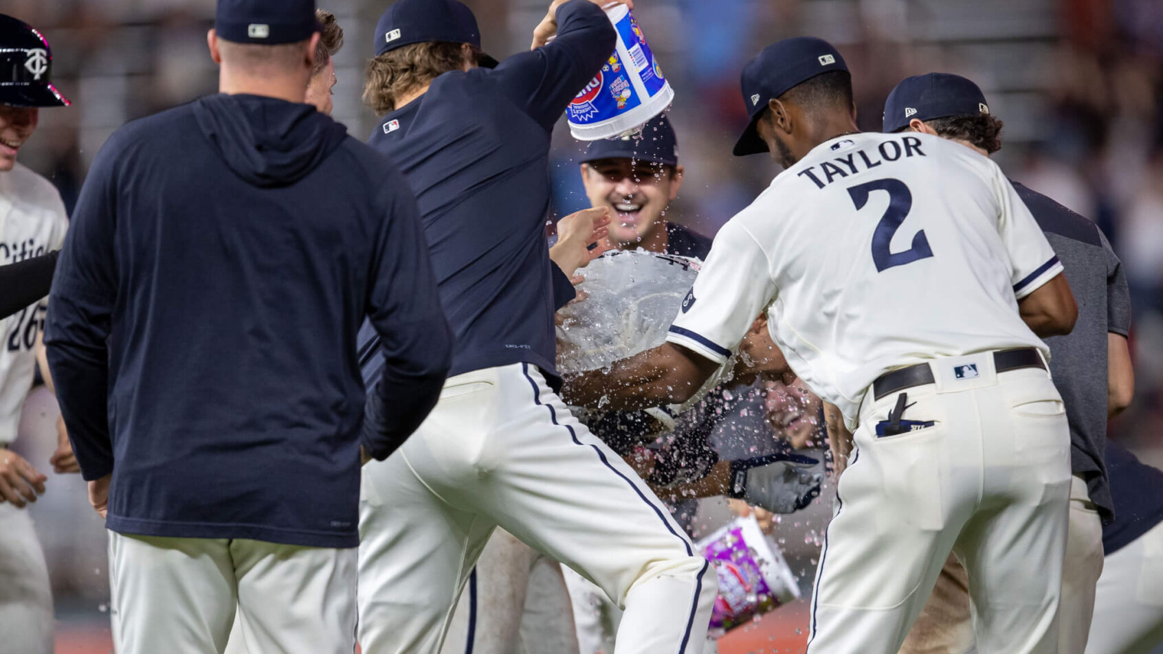 Minnesota Twins first baseman Alex Kirilloff is mobbed by teammates