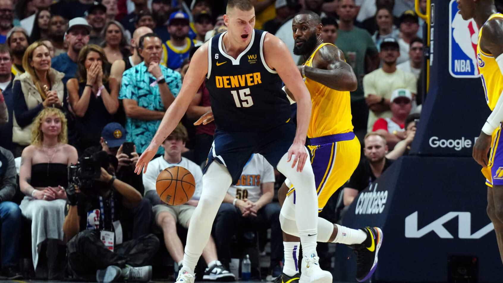 Nikola Jokic backing down a defender