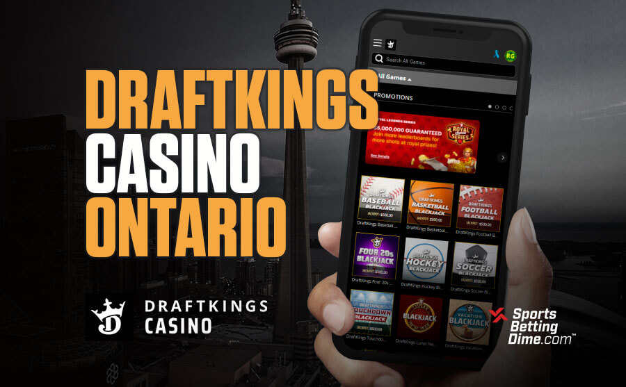 DraftKings Casino Ontario hand holding mobile phone CN Tower