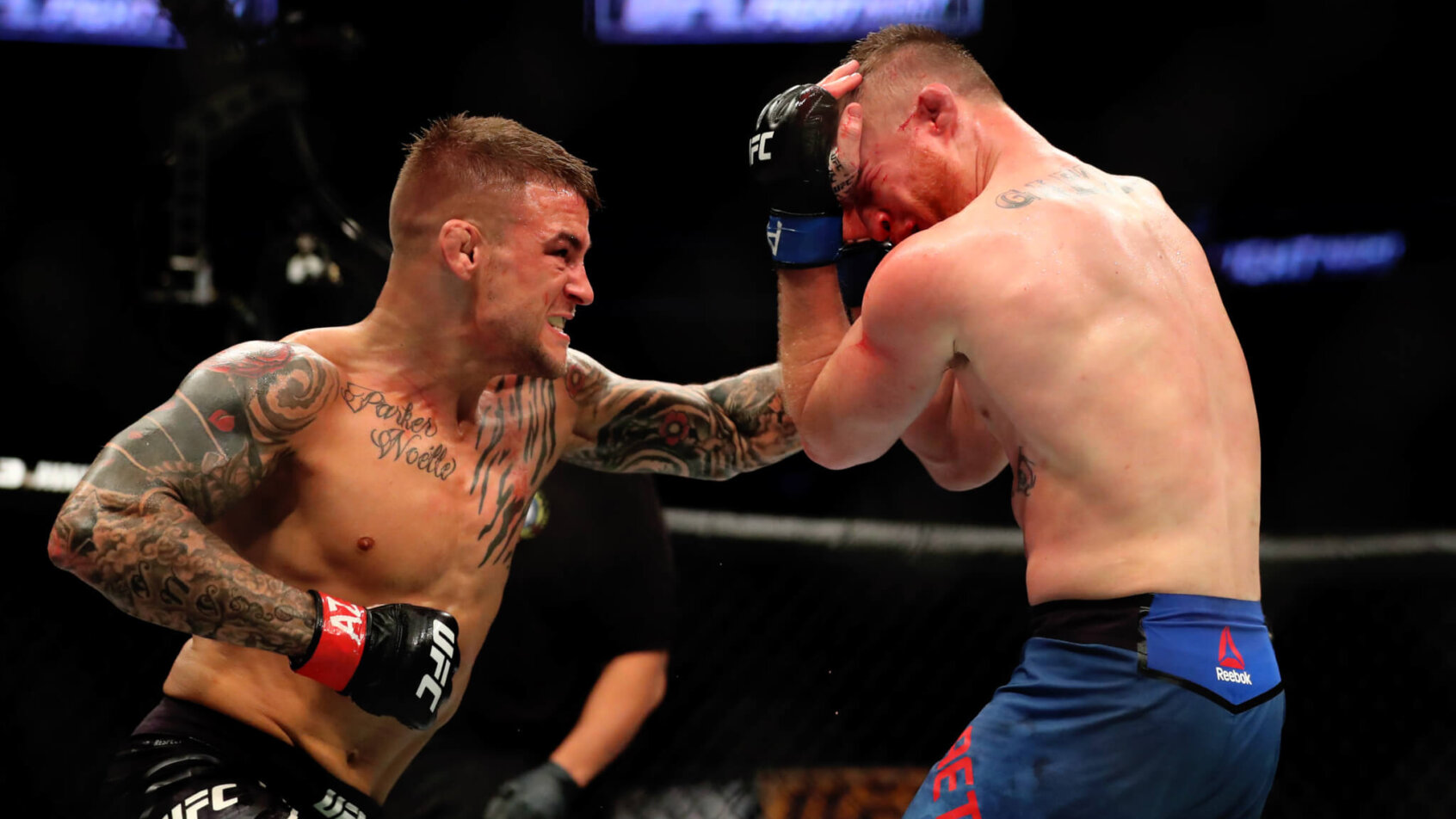 Dustin Poirier punching Justin Gaethje