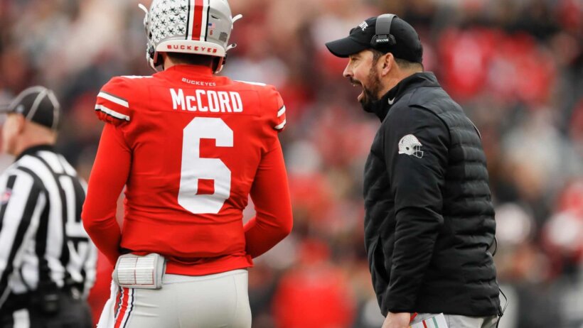 Ohio State Buckeyes head coach Ryan Day gives a play to quarterback Kyle McCord
