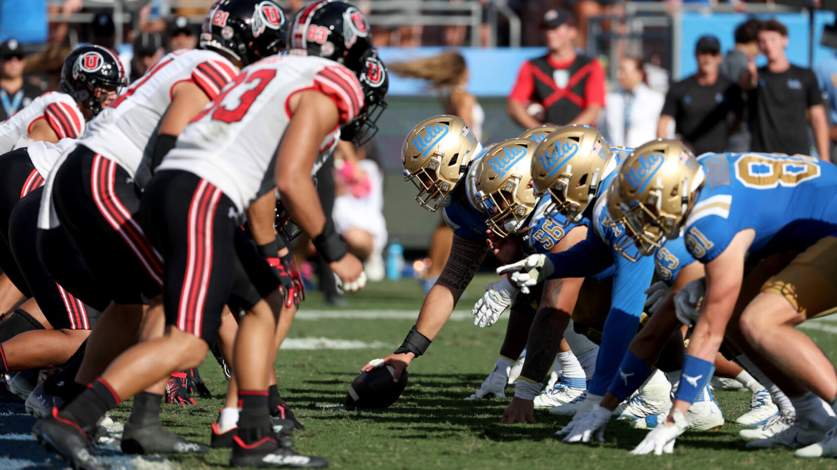 The UCLA Bruins offensive line on the line of scrimmage against the Utah Utes