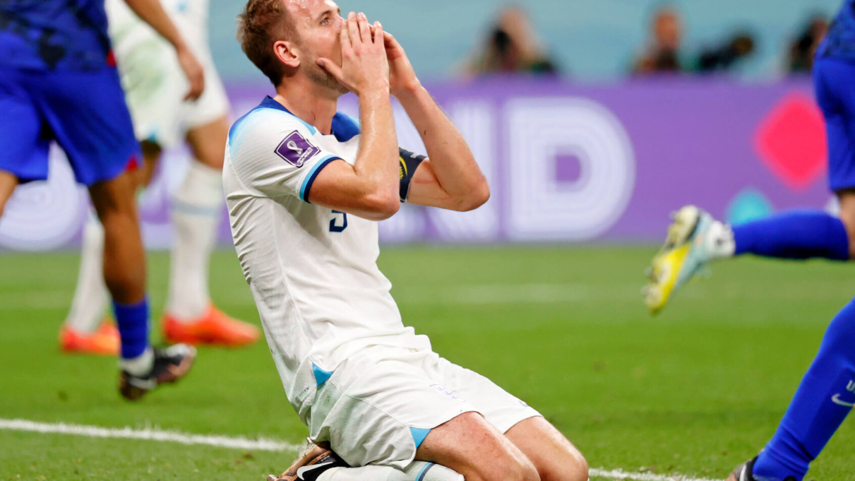 Harry Kane on his knees after missing a chance for England