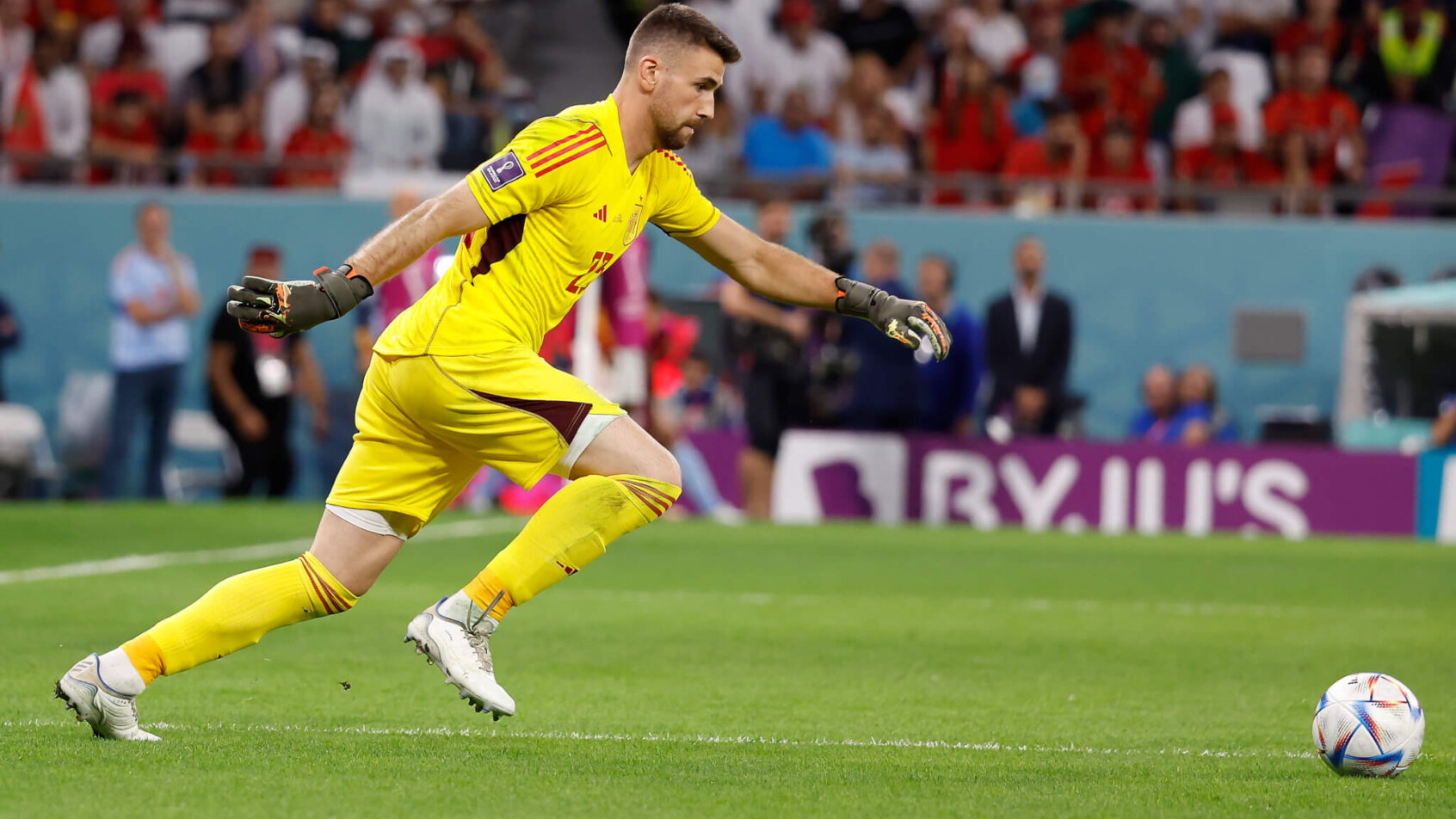 Spain goalkeeper Unai Simon clears the ball into play