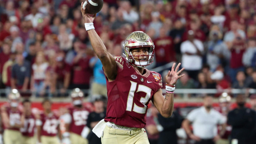 Florida State Seminoles quarterback Jordan Travis drops back to pass