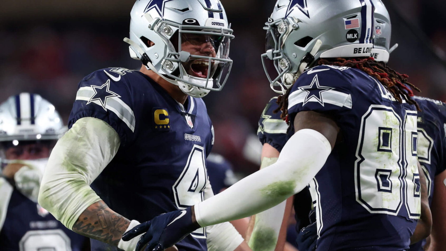 Dak Prescott celebrates with CeeDee Lamb