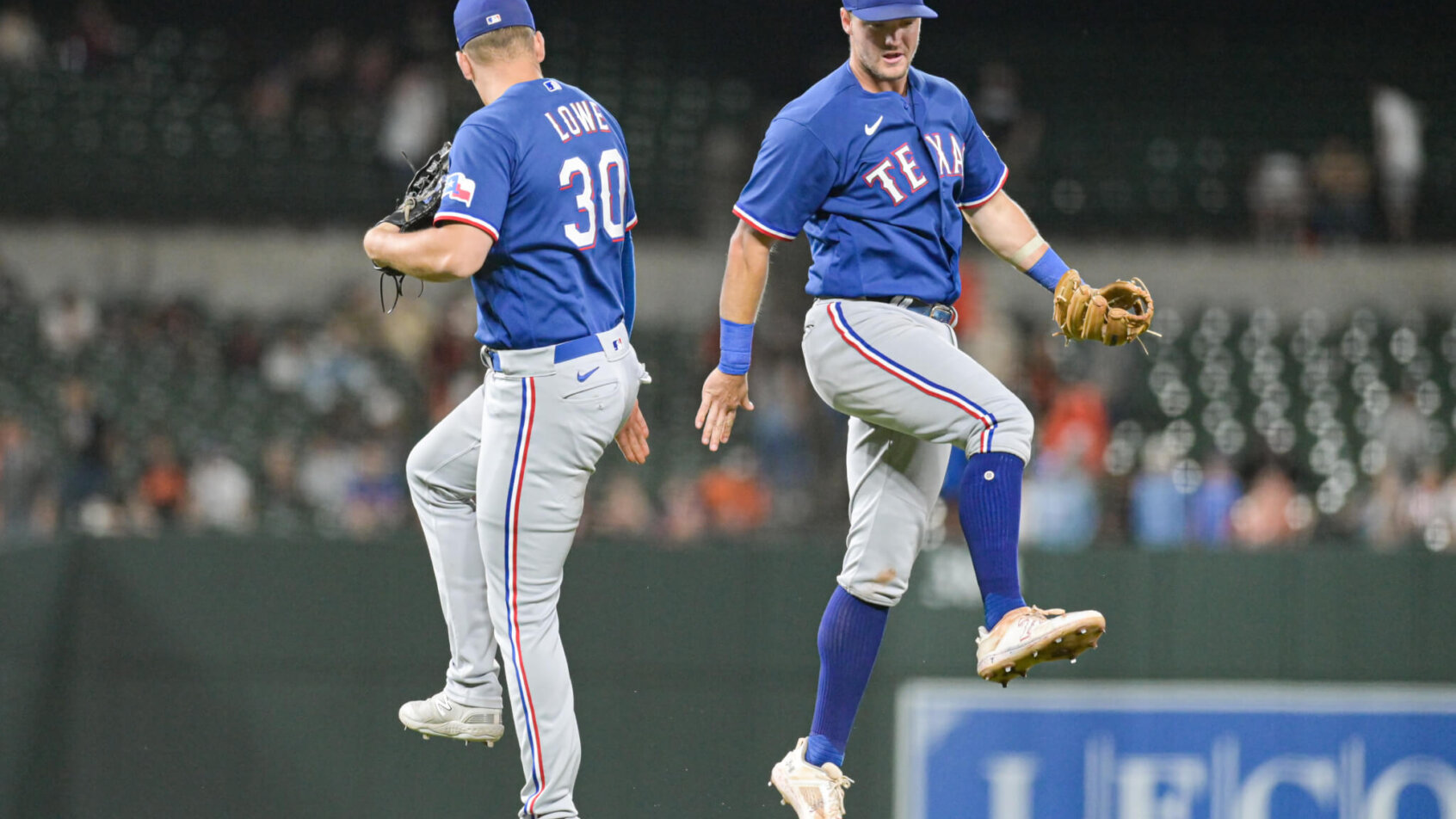 Texas Rangers Josh Jung and Nathaniel Lowe celebrating.