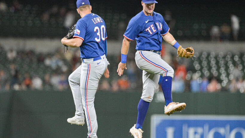Texas Rangers Josh Jung and Nathaniel Lowe celebrating.
