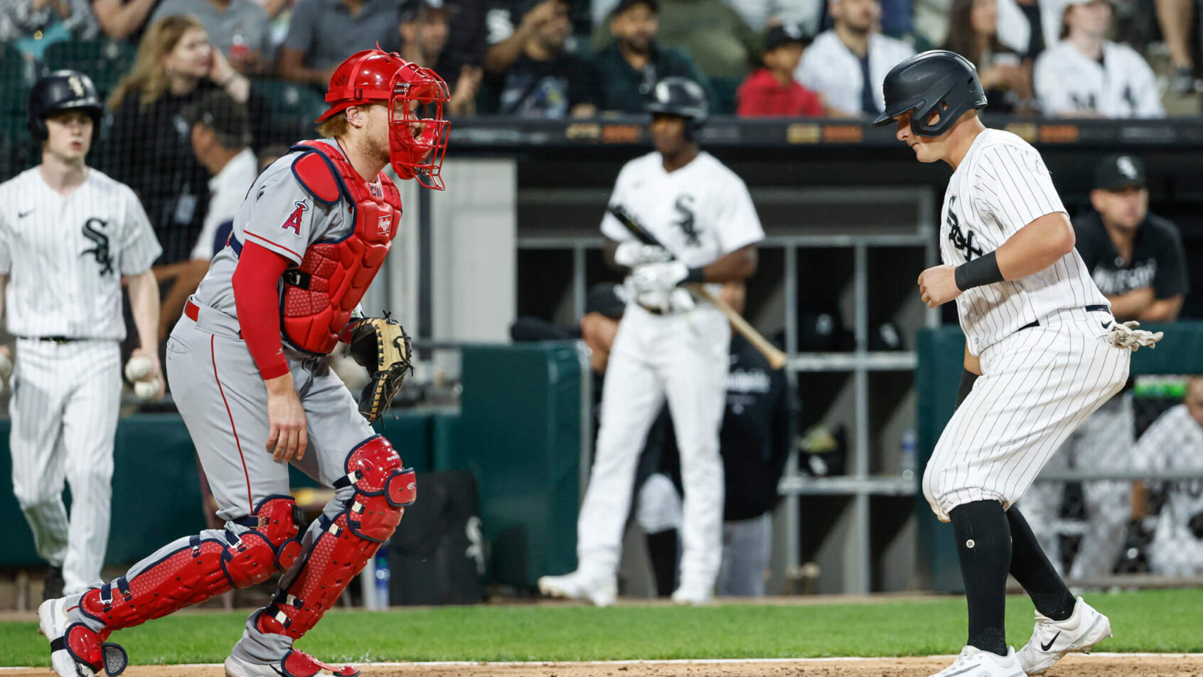 Chicago White Sox first baseman Andrew Vaughn scoring a run