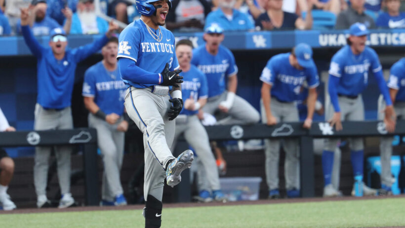 Kentucky Wildcats baseball player Devin Burkes celebrating blue jersey