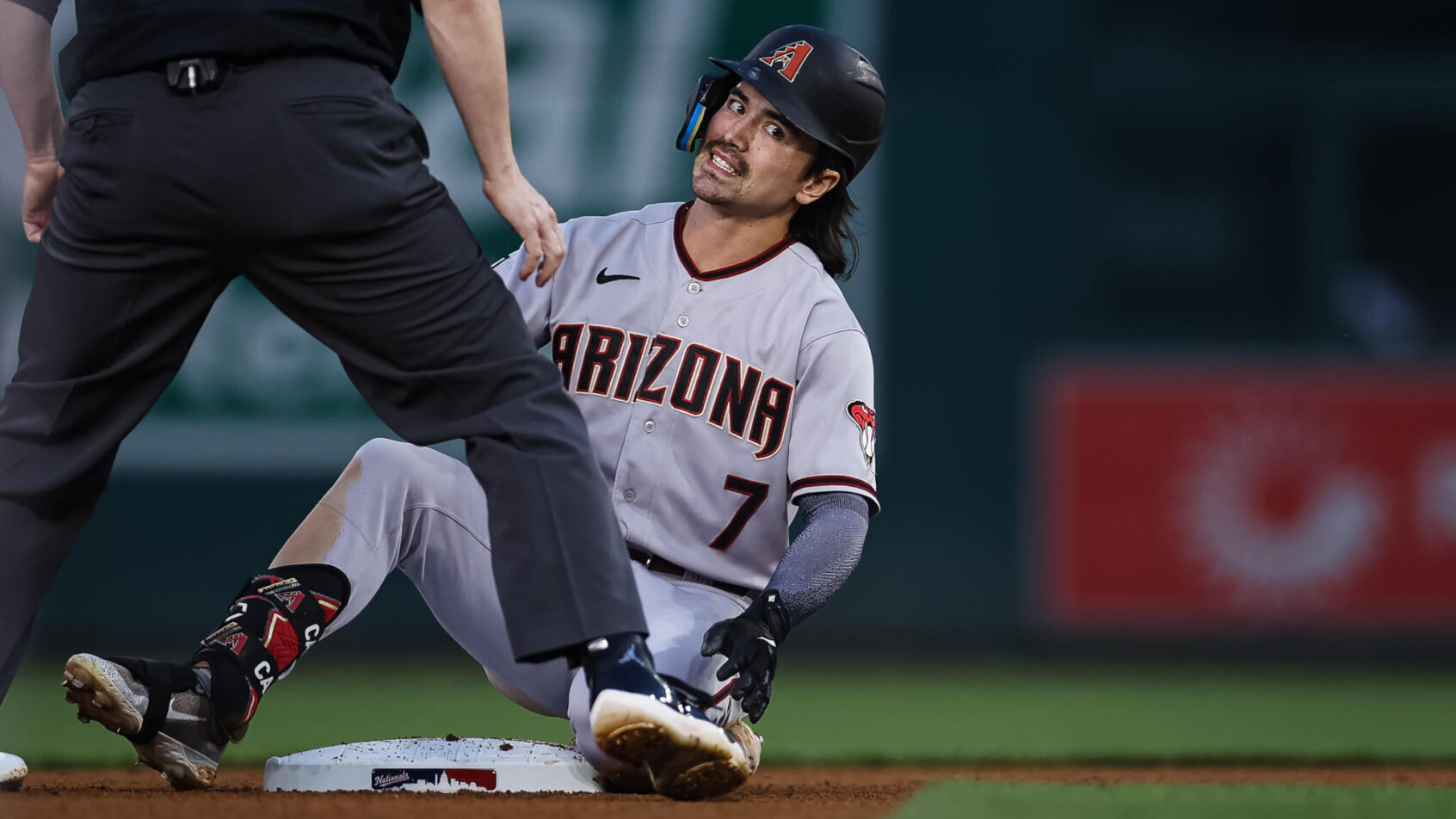 Corbin Carroll reaction on ground beside second base