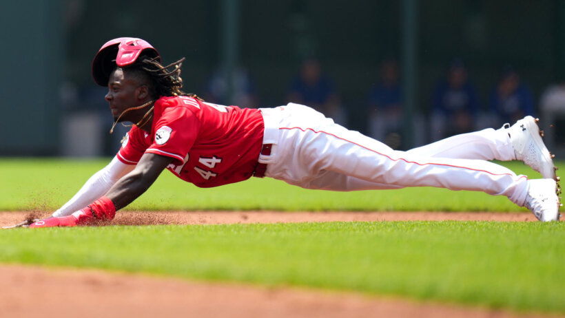 Elly De La Cruz slides into second base