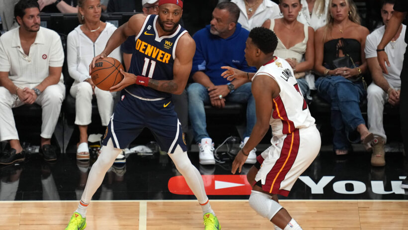 NBA Finals action between the Heat and Nuggets.