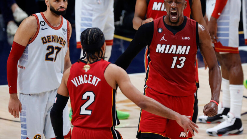Miami Heat center Bam Adebayo celebrates with guard Gabe Vincent