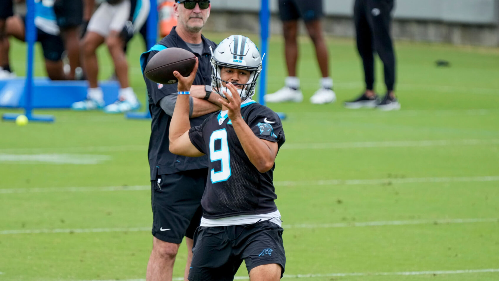 Carolina Panthers head coach Frank Reich watches quarterback Bryce Young