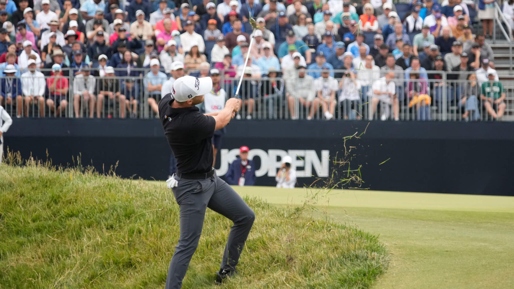 Wyndham Clark hits on the 14th hole during the second round of the U.S. Open golf tournament.
