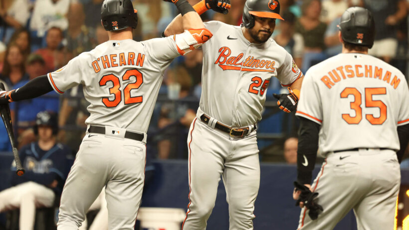 Anthony Santander celebrates with Ryan O'Hearn