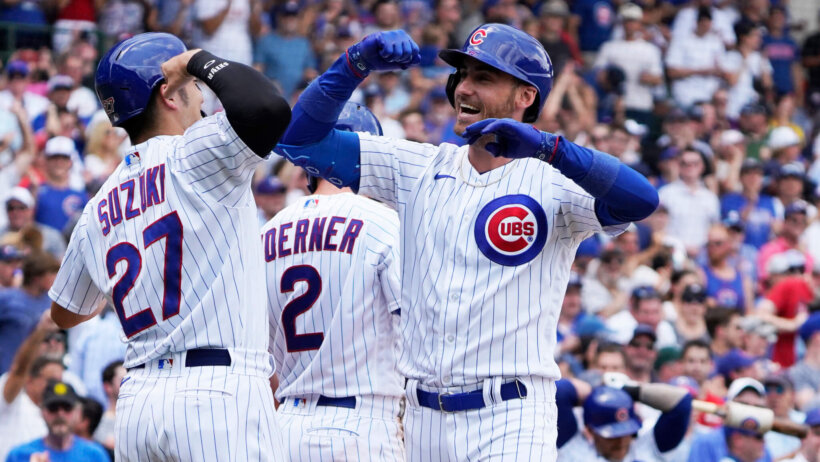Cody Bellinger celebrating with this Cubs teammates.