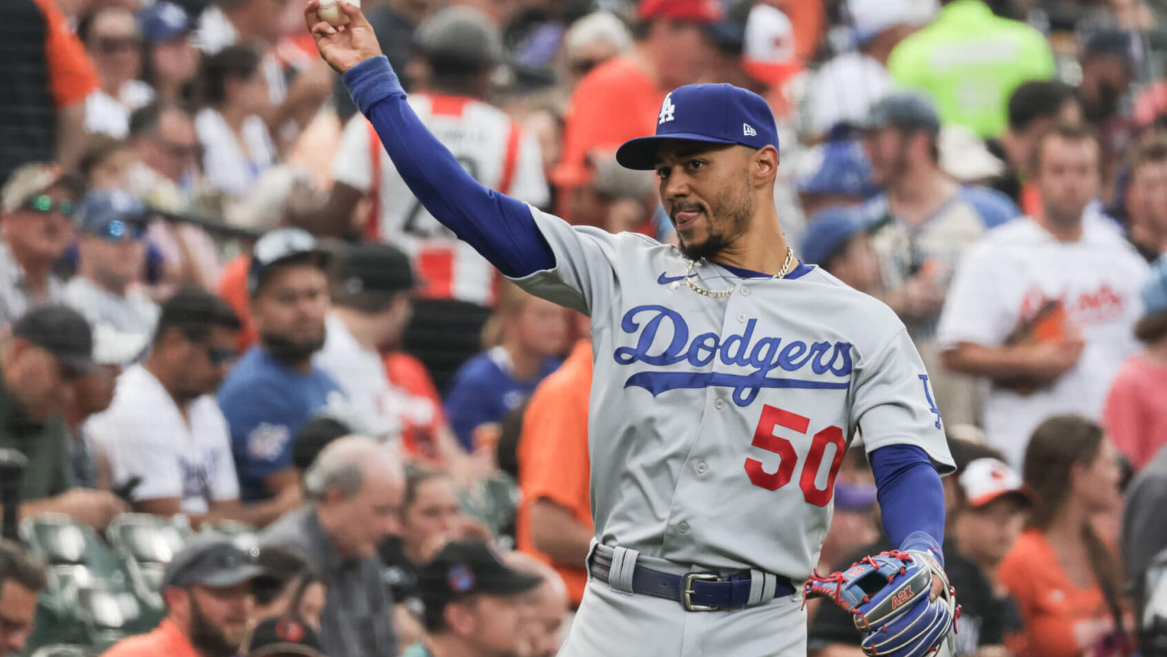 Los Angeles Dodgers right fielder Mookie Betts throwing the ball