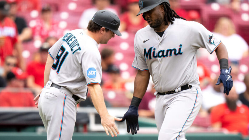 Josh Bell low-five with coach during home run trot