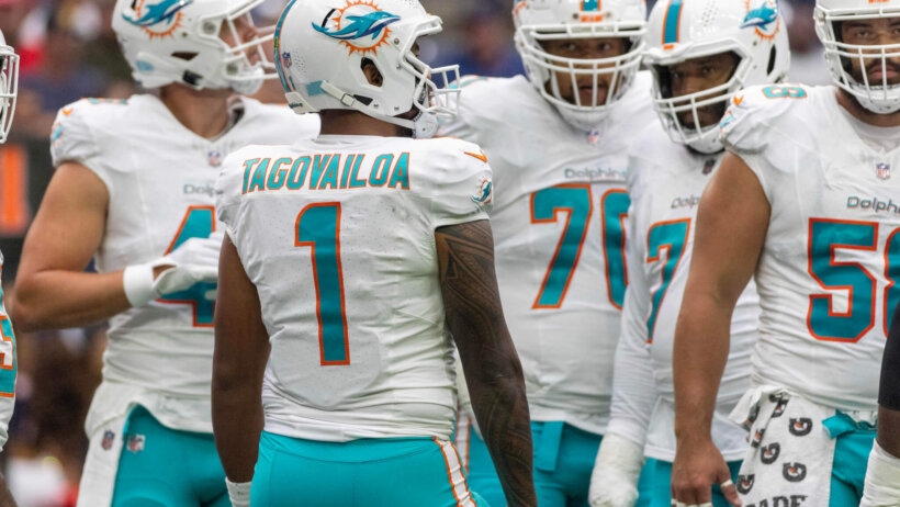 Dolphins quarterback Tua Tagovailoa (1) waits for a play to be called against the Houston Texans