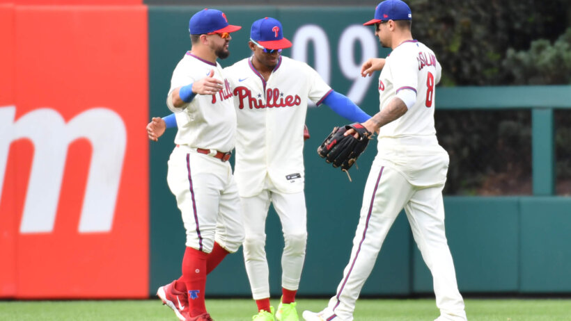 Phillies outfielders Castellanos, Schwarber, and Rojas.