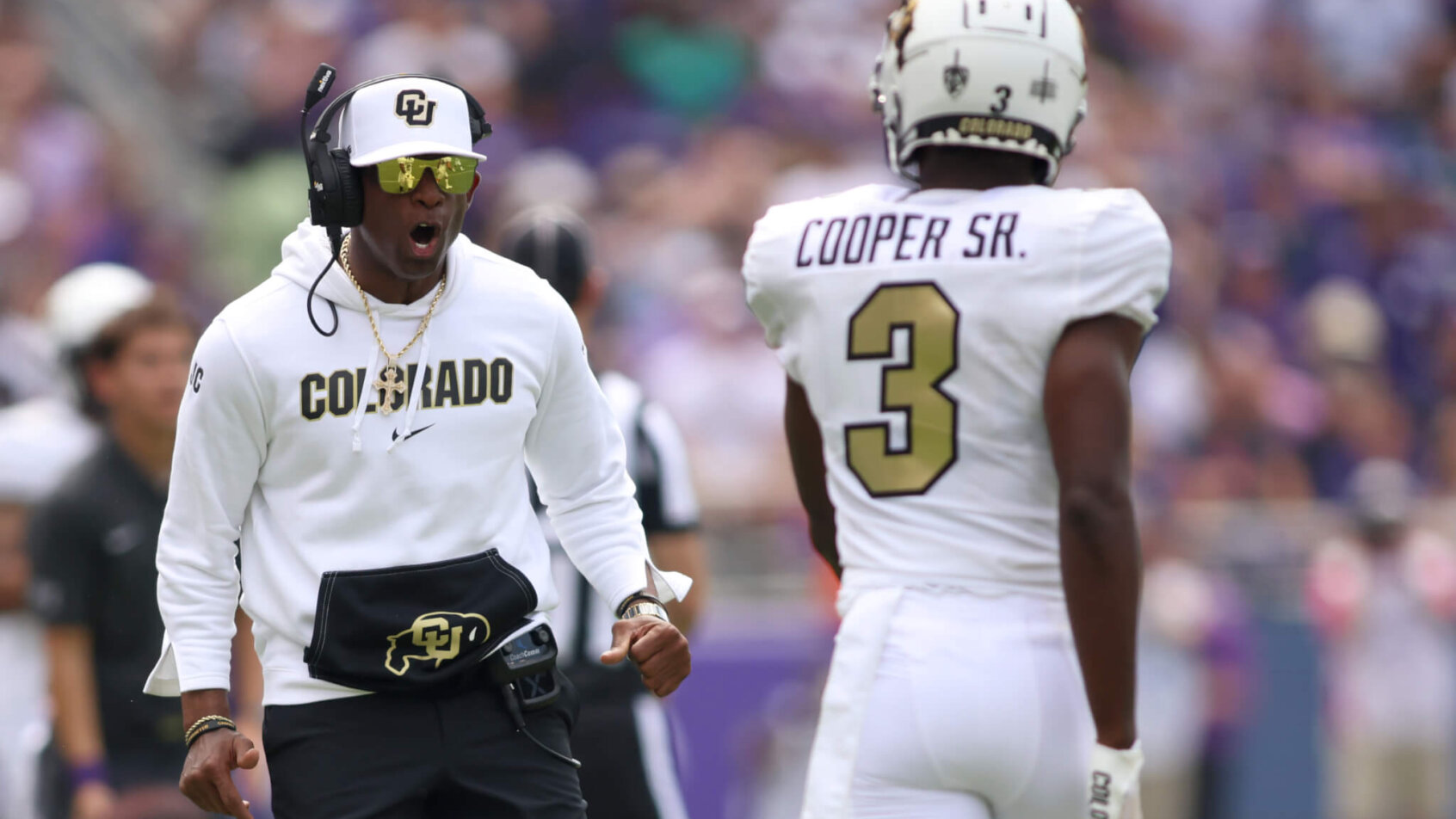 Colorado Buffaloes head coach Deion Sanders reacts