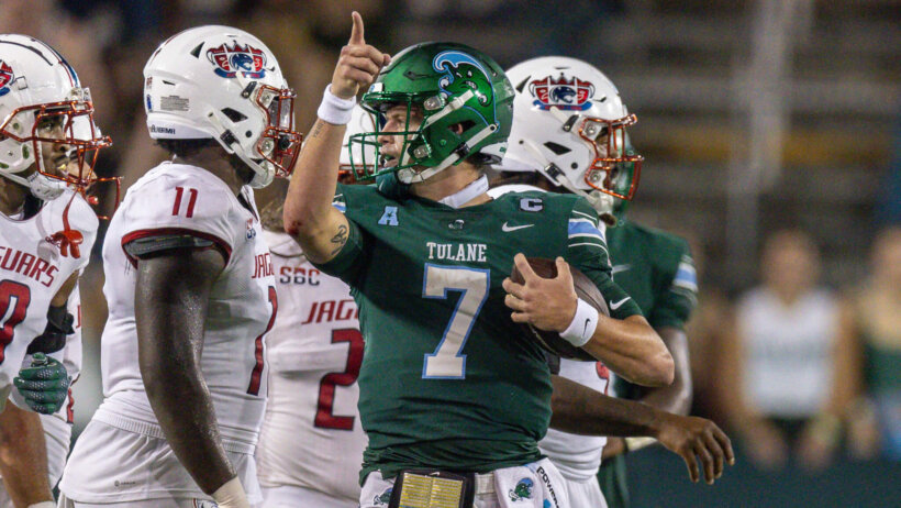 Tulane Green Wave quarterback Michael Pratt reacts to making a first down