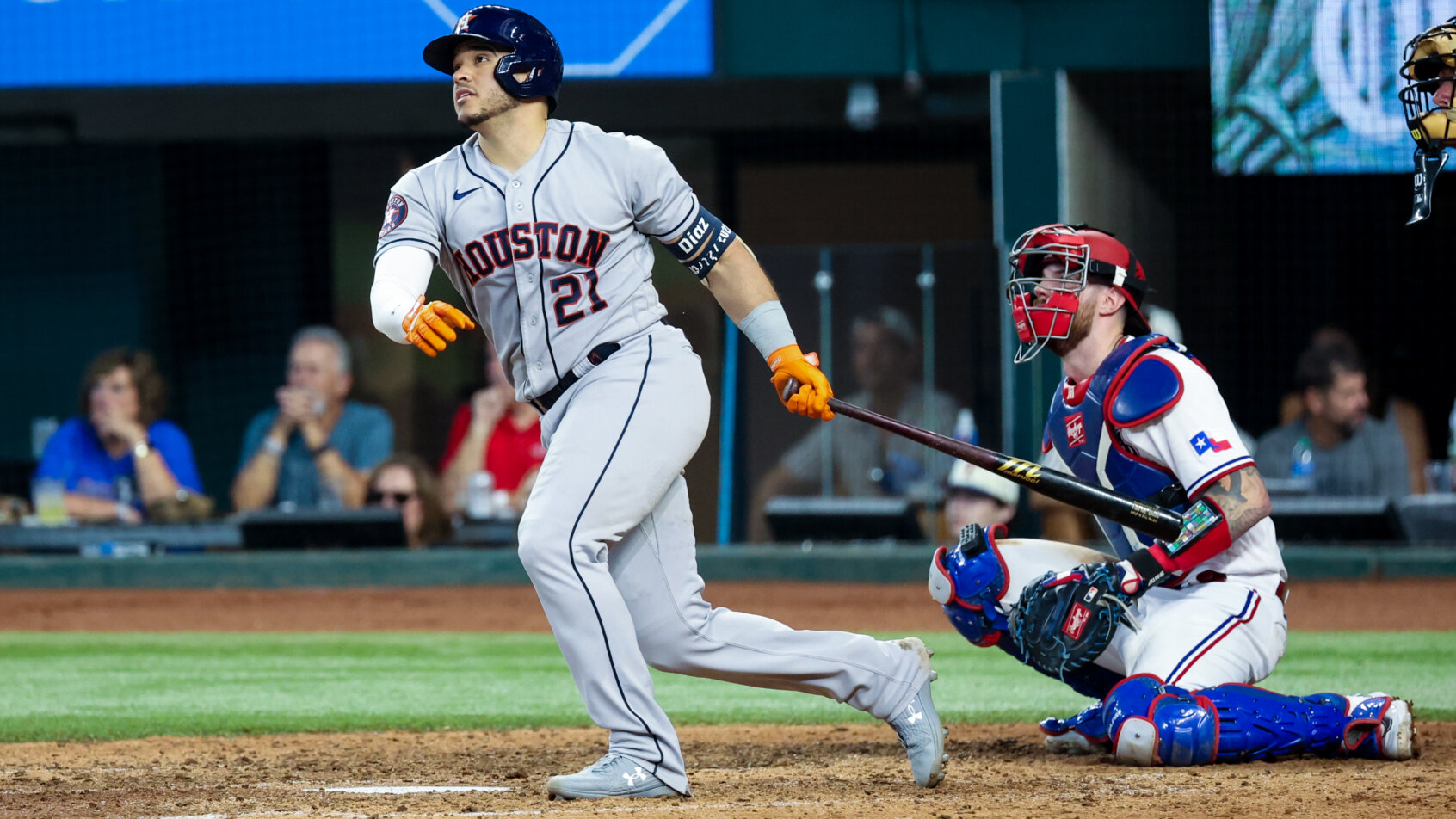 Houston Astros catcher Yainer Diaz hitting a home run against the Texas Rangers