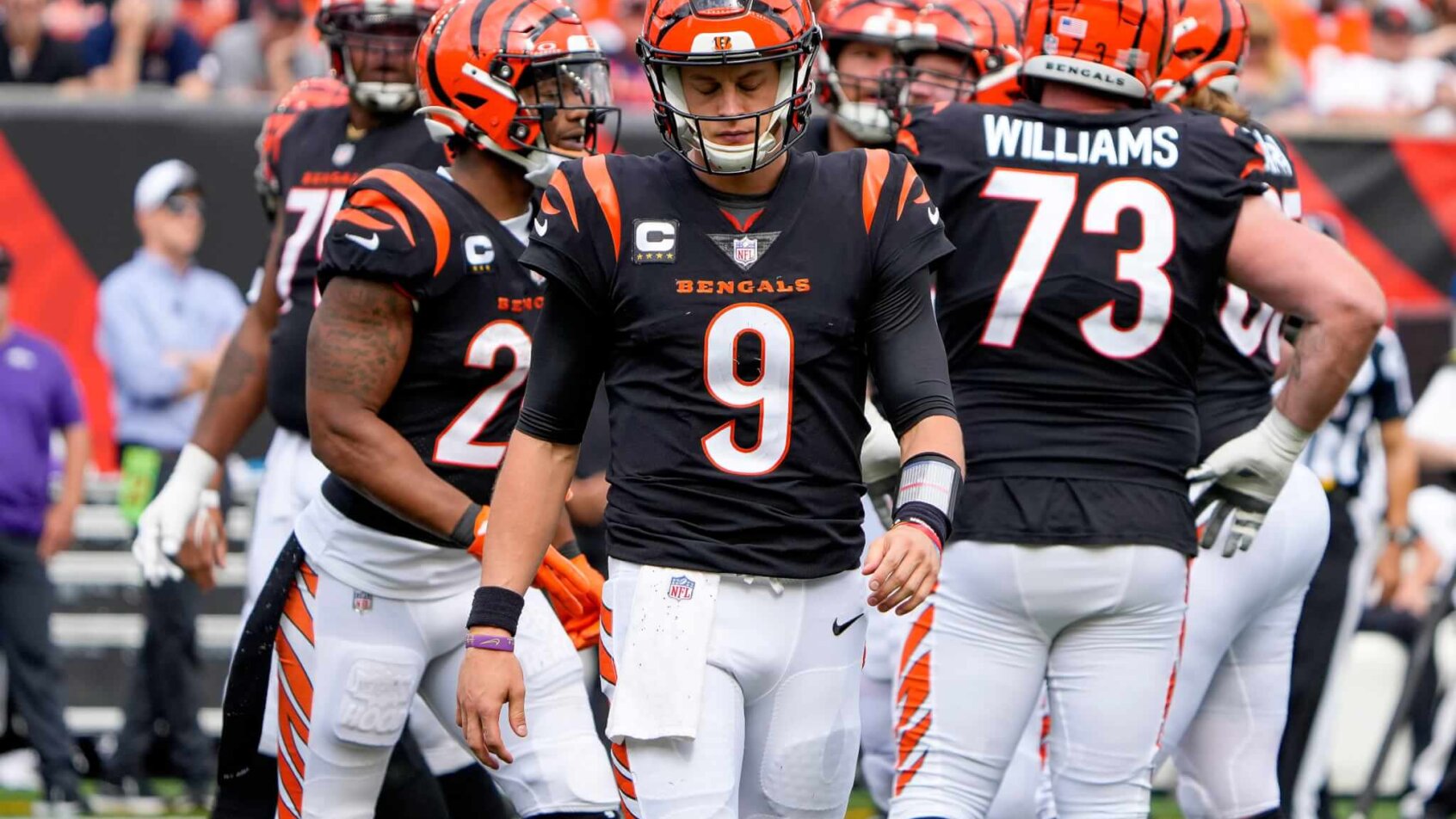 Cincinnati Bengals quarterback Joe Burrow looking at the ground
