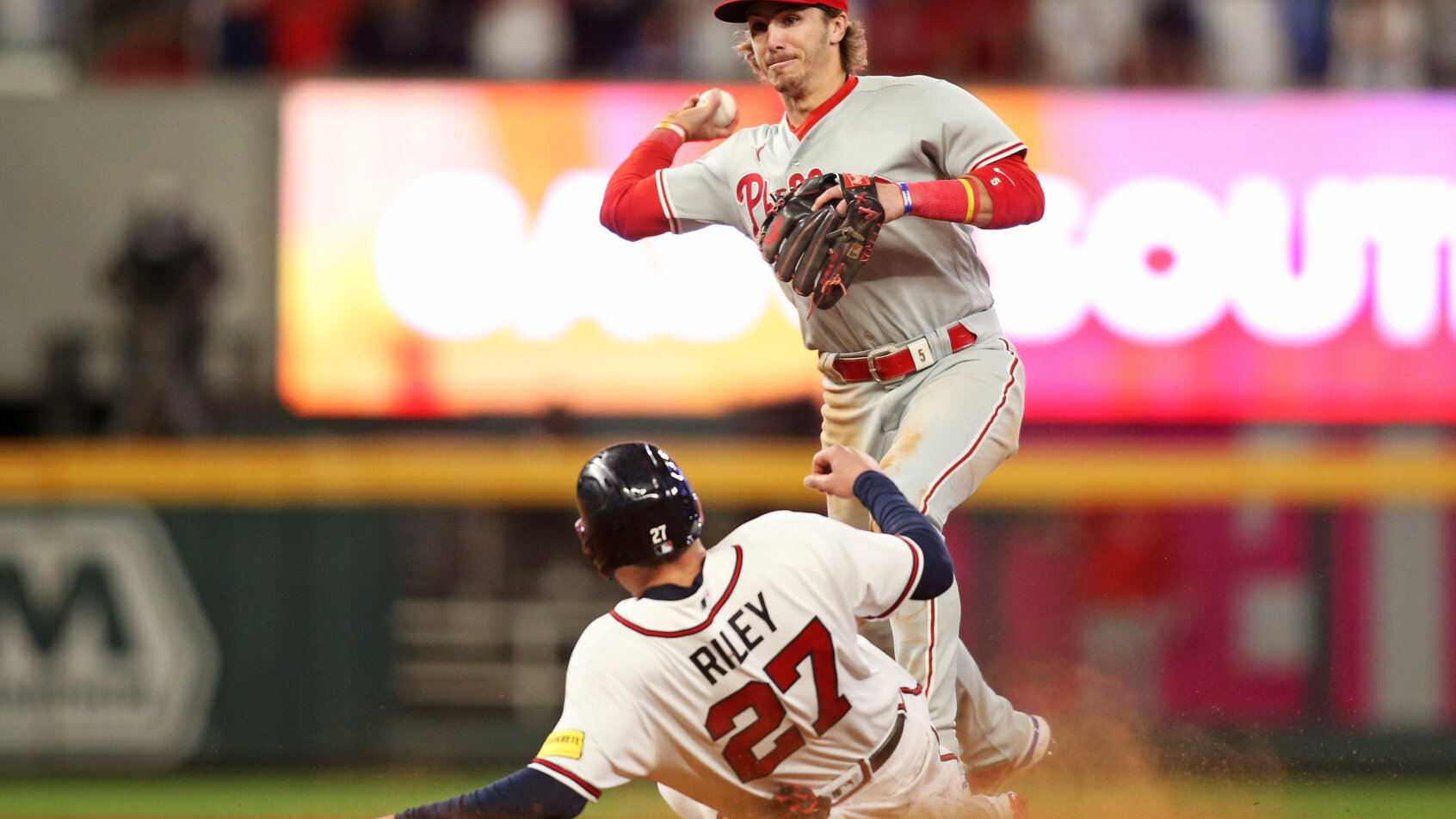 Philadelphia Phillies second baseman Bryson Stott turning a double play against the Atlanta Braves