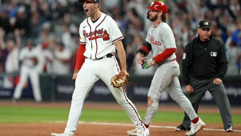 Atlanta Braves third baseman Austin Riley celebrates a win over the Philadelphia Phillies in the 2023 NLDS