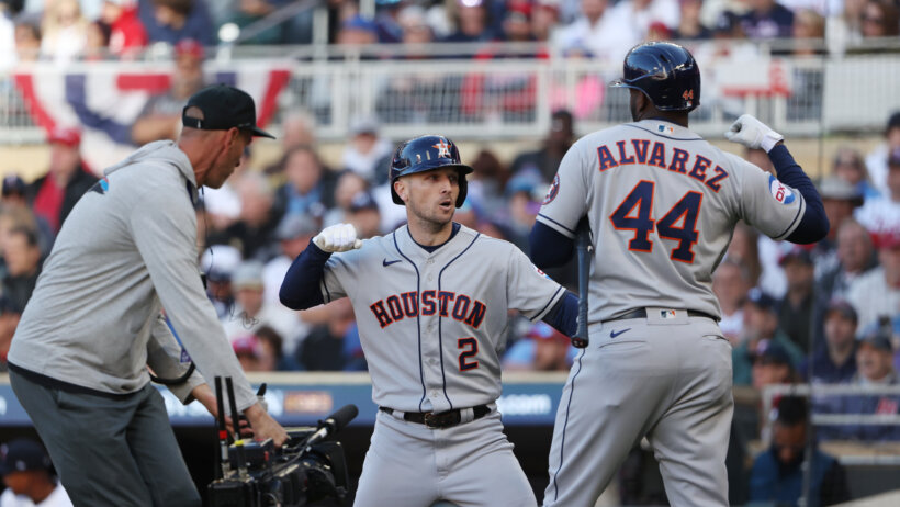 Houston Astros teammates Alex Bregman and Yordan Alvarez celebrate a home run against the Minnesota Twins