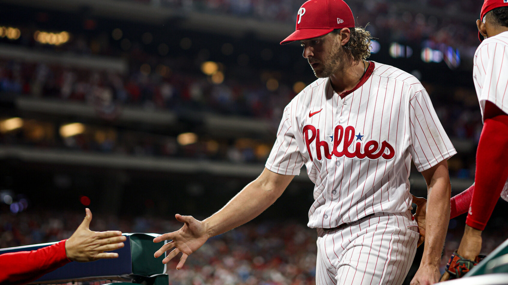 Philadelphia Phillies starting pitcher Aaron Nola entering the dugout