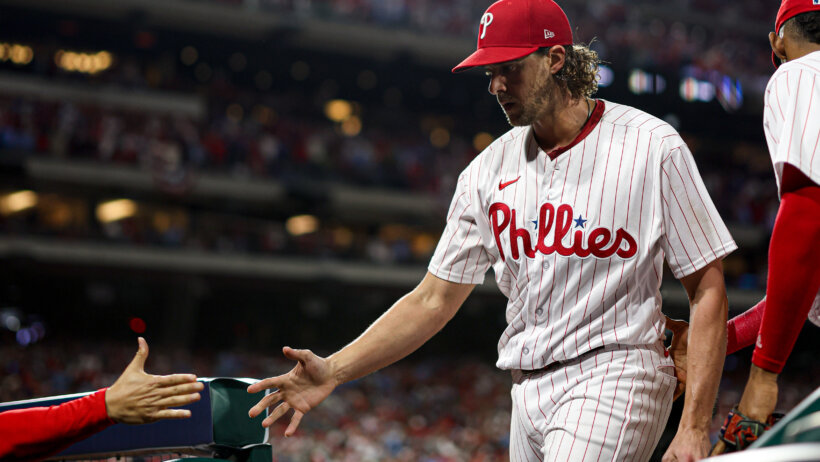 Philadelphia Phillies starting pitcher Aaron Nola entering the dugout
