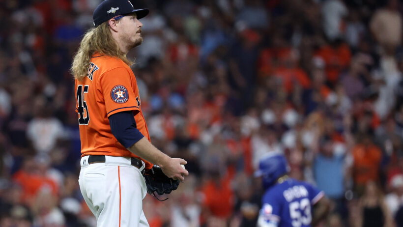 Houston Astros relief pitcher Ryne Stanek looks forlorn after giving up a grand slam to Adolis Garcia